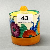 A Clarice Cliff Gayday pattern marmalade pot, H. 9.5cm.
