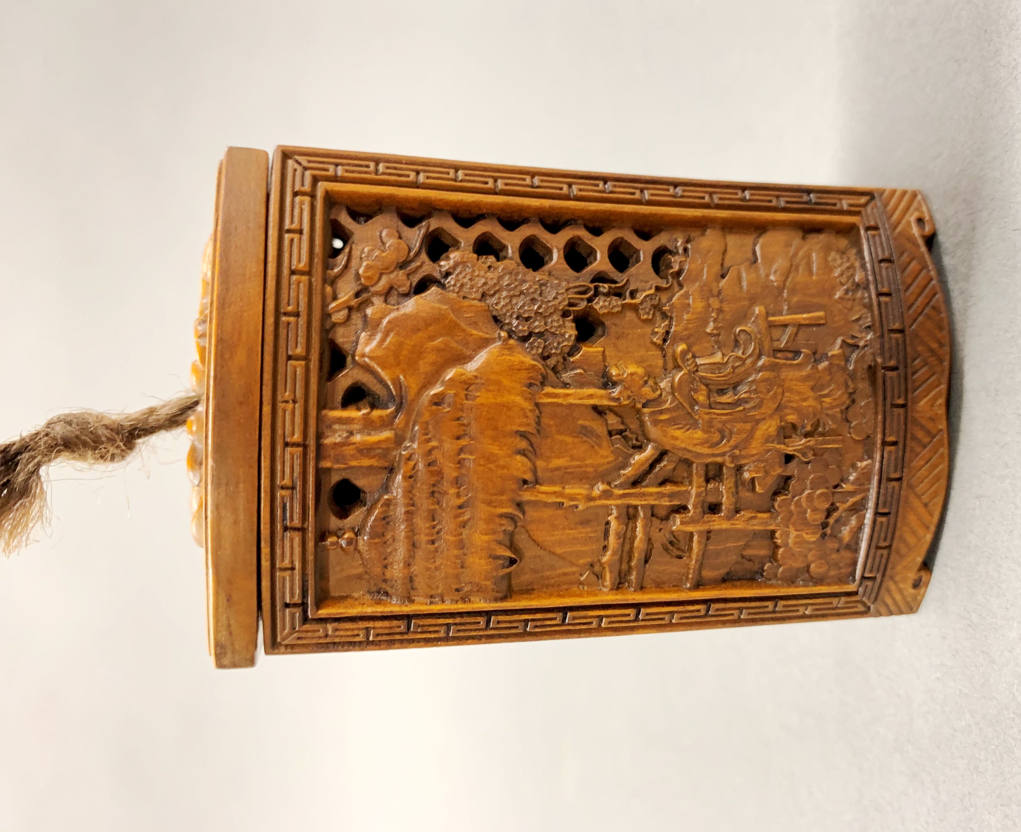 A finely carved Chinese walnut wood pomander, H. 9cm. - Image 3 of 3