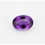 A large unmounted natural oval cut amethyst, approx. 39.65ct.