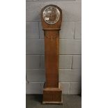 A Smiths Enfield oak cased grandaughter clock, H. 133cm.