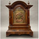 A 19th century gilt brass and mahogany veneered cased mantel clock, H. 36cm, W. 17cm.