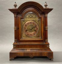 A 19th century gilt brass and mahogany veneered cased mantel clock, H. 36cm, W. 17cm.