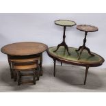 An oak oval nest of three tables, largest 82 x 54 x 54cm (stain to top), together with an oval