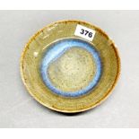 A Chinese glazed pottery dish, Dia. 17cm.