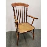 An oak carver hall chair, H. 100cm.