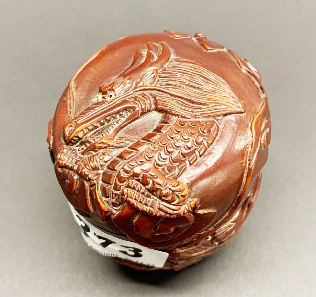 A Chinese carved fruitwood box with inset signature panel and glass eyes to the dragons, H. 8cm, - Image 2 of 3