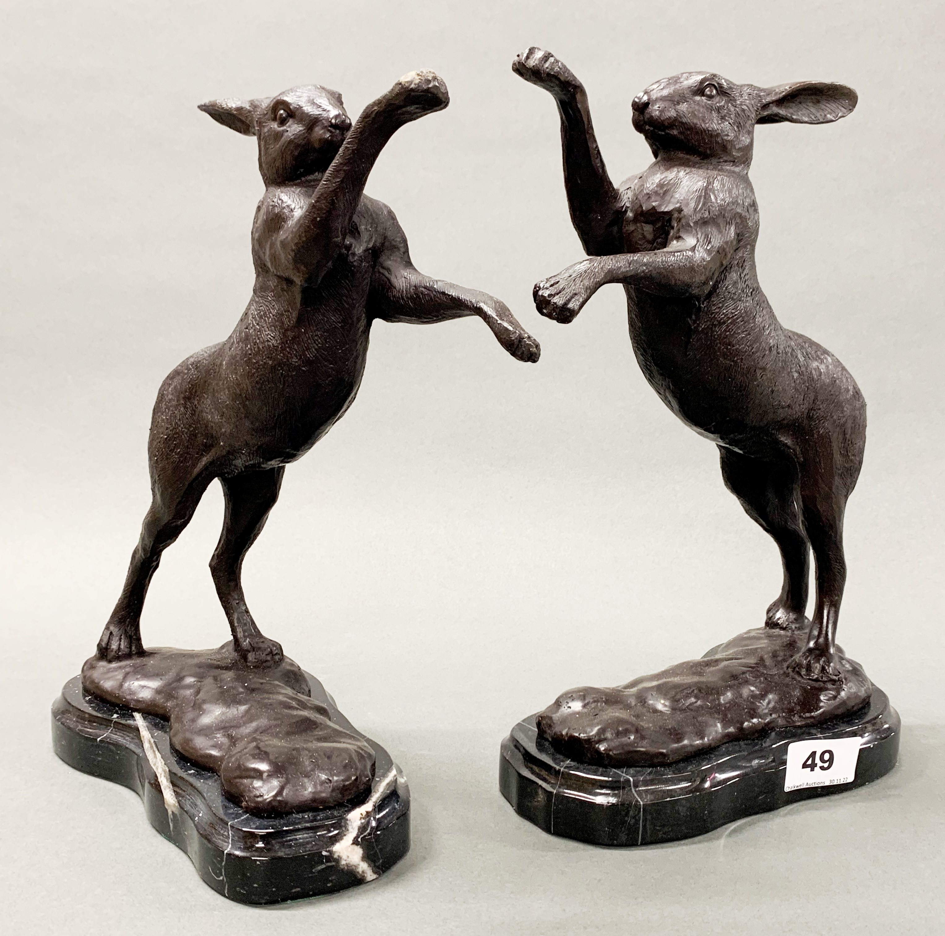 A pair of bronze figures of boxing hares on grey marble bases. - Image 2 of 3