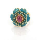 A gold on 925 silver enamelled ring set with cabochon cut ruby, (O).