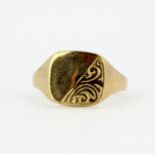 A 9ct yellow gold signet ring, (T).