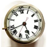 A silvered brass military wall clock dated 1945, Dia. 15cm.