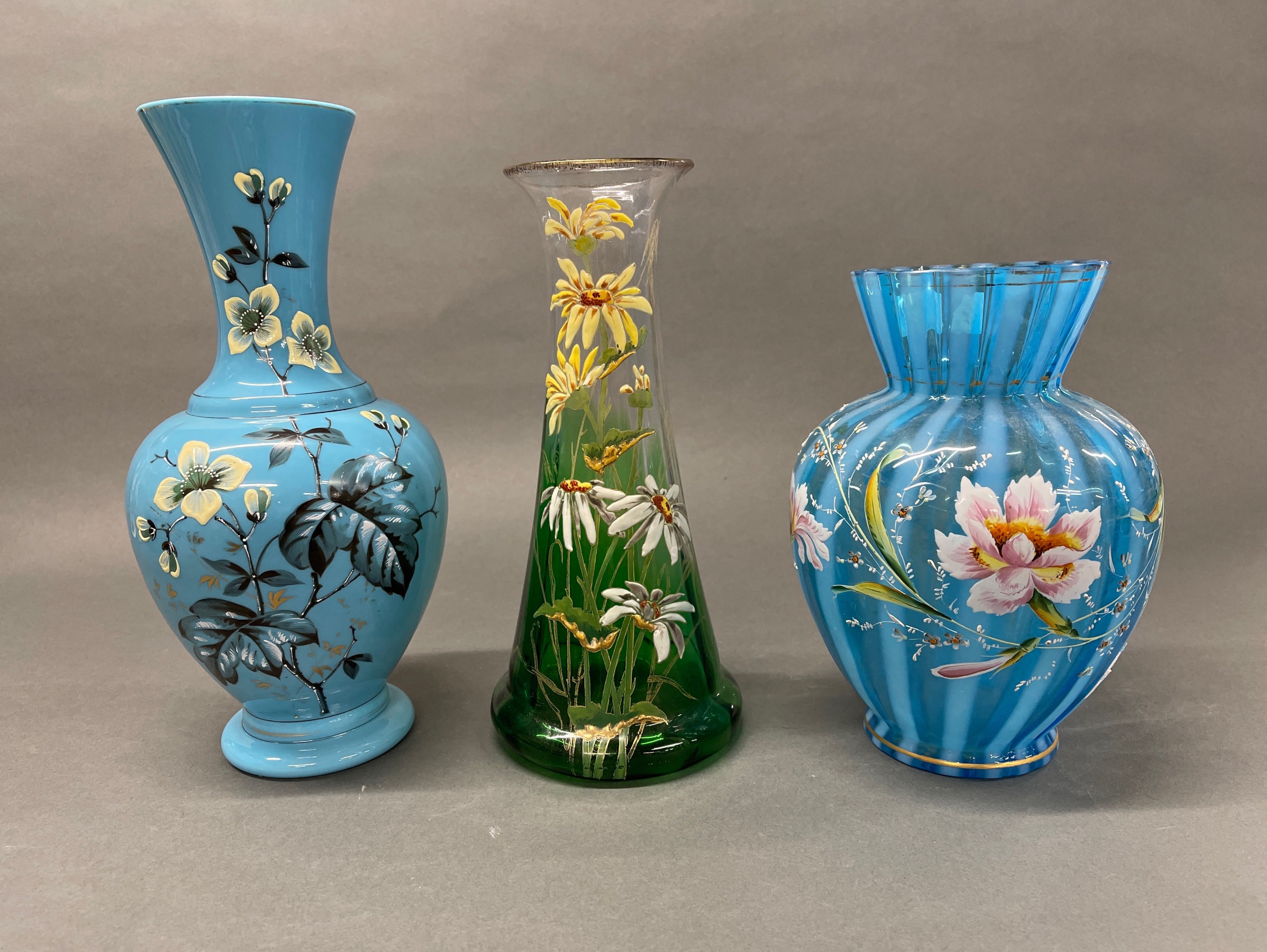 Three 19th century hand painted glass vases, tallest H. 30cm.