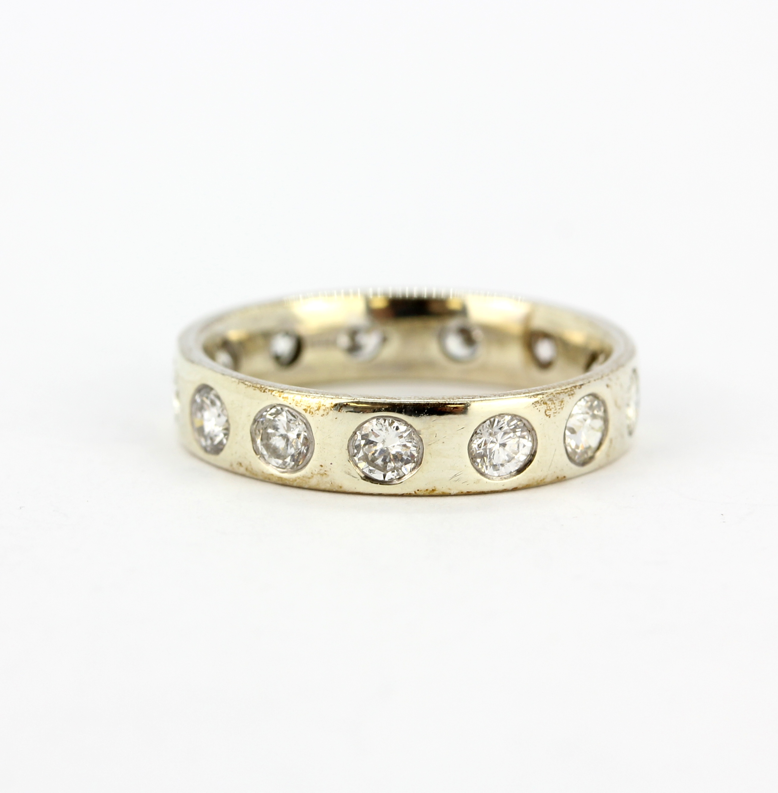 A white metal (tested 14ct gold) full eternity ring set with brlliant cut diamonds, approx. 1ct - Image 2 of 2