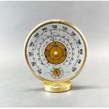 A Jaeger 1970's barometer, Dia. 17cm.