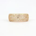 An 18ct rose gold (stamped 750) diamond pave set ring, (O).