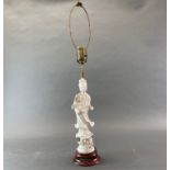 A Chinese Blanc de Chine porcelain table lamp of the Goddess Guanyin, H. 64cm.