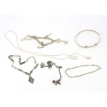 Three 925 silver necklaces (one clasp missing), two silver bracelets anda silver bangle.