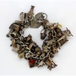 A heavy silver charm bracelet.