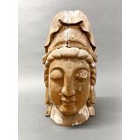 A large Chinese carved wooden head of the Goddess Guanyin. H 40cm