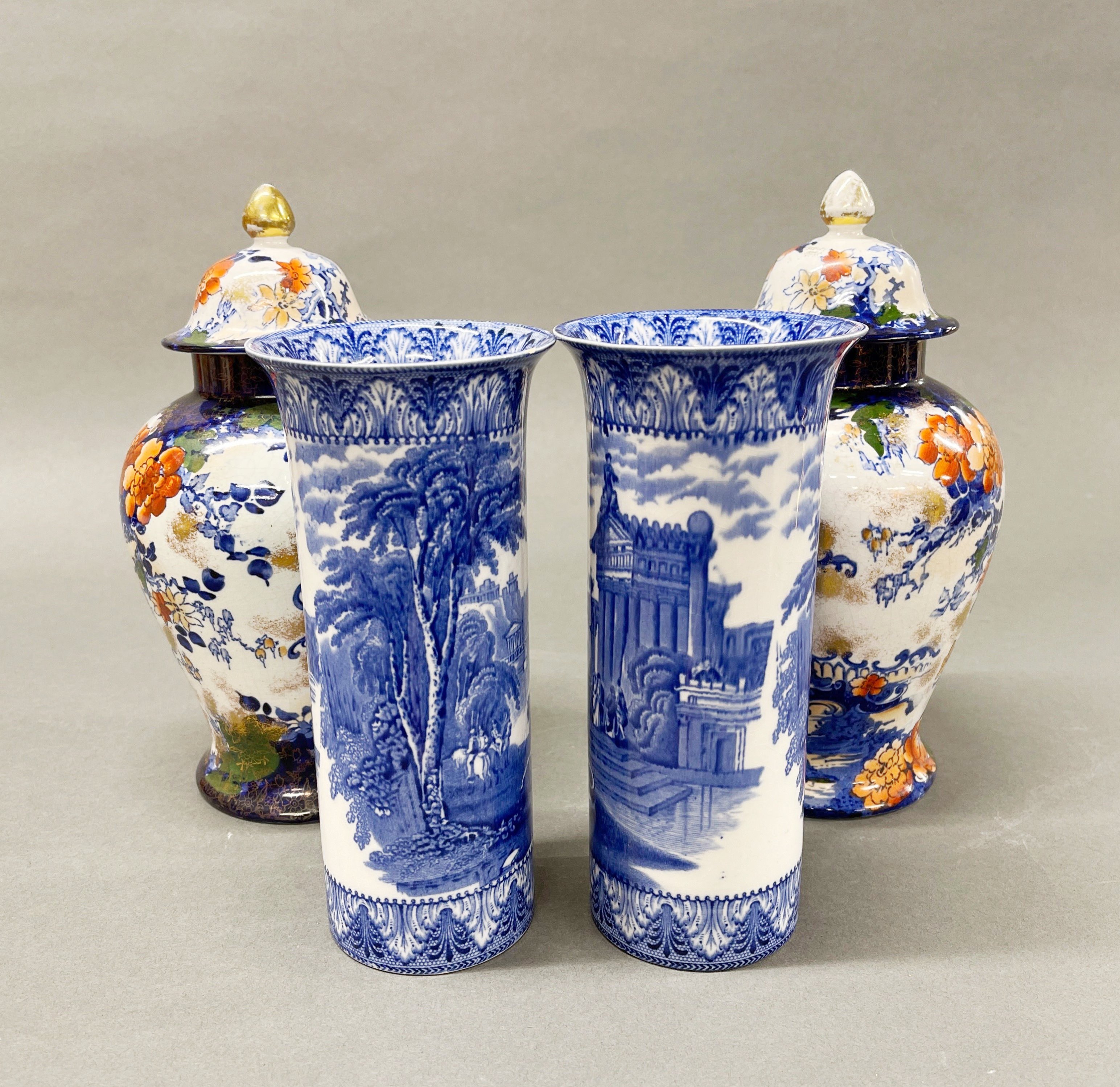 A pair of Phoenix ware Kyoto pattern jars and lids with a pair of 19th century cylinder vases (