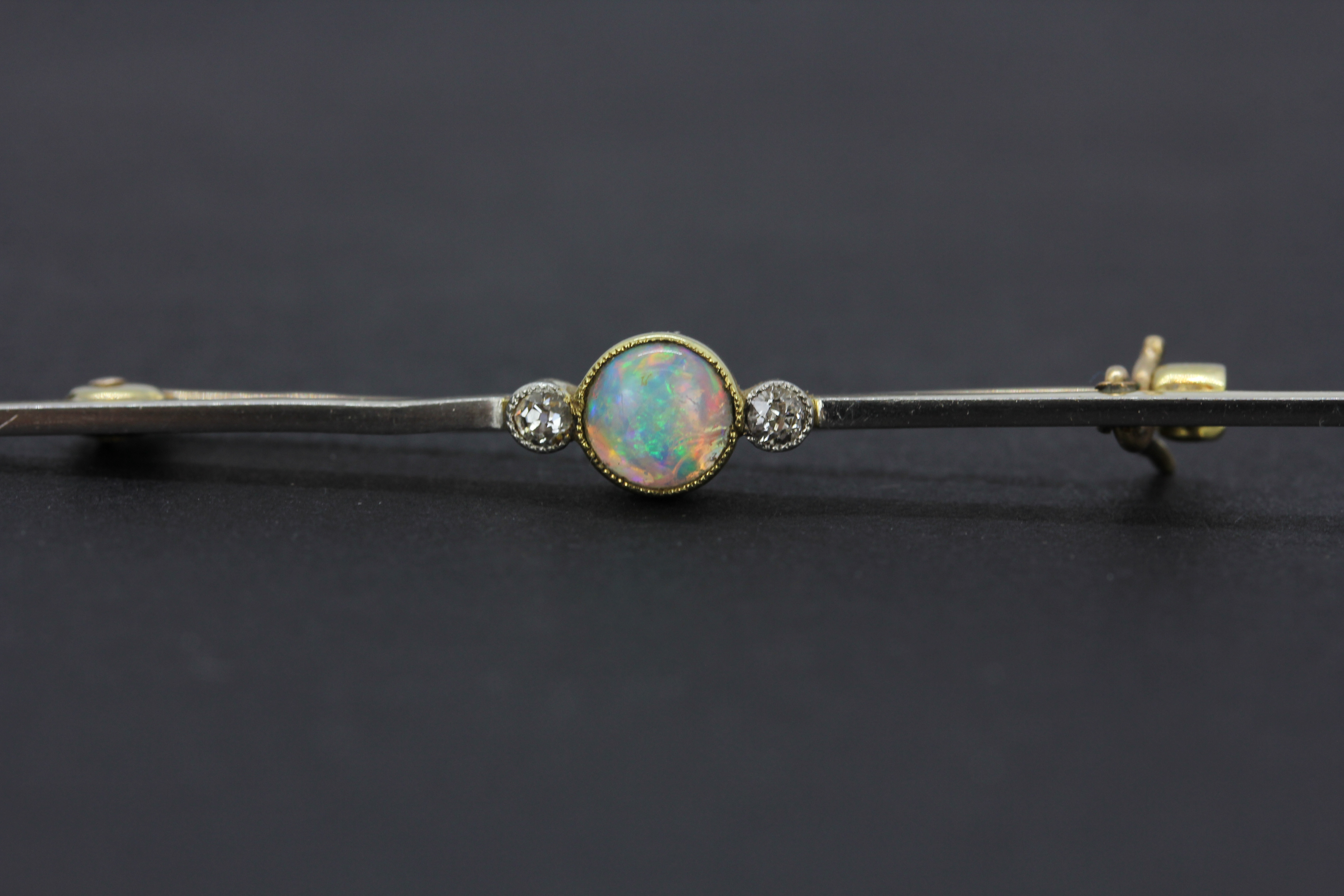 A 15ct yellow and white gold opal and diamond set bar brooch, with 9ct yellow gold (stamped 9ct) - Image 5 of 6