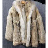 A vintage wolf skin jacket, L. 75cm.