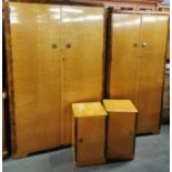A set of Art Deco 'Austinsuite' burr walnut veneered and birds eye maple wardrobes together with a