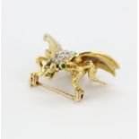 An 18ct yellow and white gold (Stamped 18k) insect shaped brooch set with brilliant cut diamonds and