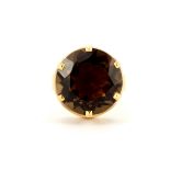 A 1970's 14ct yellow gold (Stamped 585) ring set with smokey quartz, shank a/f, (R).