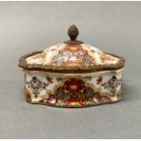 A bronze mounted Chinese export porcelain box, W. 6cm, H. 10cm.