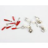 A bag of 9 silver pearl set pendants, together with 8 silver and coral pendants.