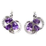 A pair of 925 silver earrings set with pear and oval cut amethysts and white stones, L. 1.6cm.