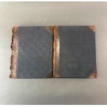 Two half leather bound volumes of The Living Races of Mankind, 27 x 23 x 3cm.
