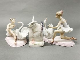 Two Lladro porcelain figurines of ballet dancers with swans, tallest H. 19cm, together with a Lladro