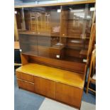 A teak and tinted glass display cabinet with fitted display lighting, 172 x 137cm.