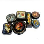 Seven hand painted Russian papier mache boxes, largest Dia. 10cm.