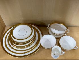 A quantity of Royal Doulton, 'Royal gold' tea and dinner china.