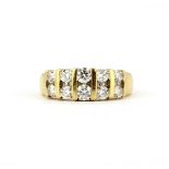 An 18ct yellow gold (stamped 18k) set with two rows of brilliant cut diamonds, (M.5).