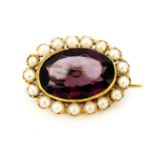 A yellow metal (tested minimum 9ct gold) amethyst and pearl set brooch, L. 2.2cm.