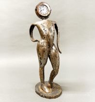 An unusual steel sculpture clock, H. 45cm.