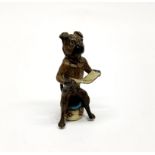 A cold painted Vienna bronze of a dog reading a newspaper, H. 8.5cm.