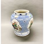 A superb large Chinese hand painted Wucai porcelain vase, H. 42cm, Dia. 39cm.
