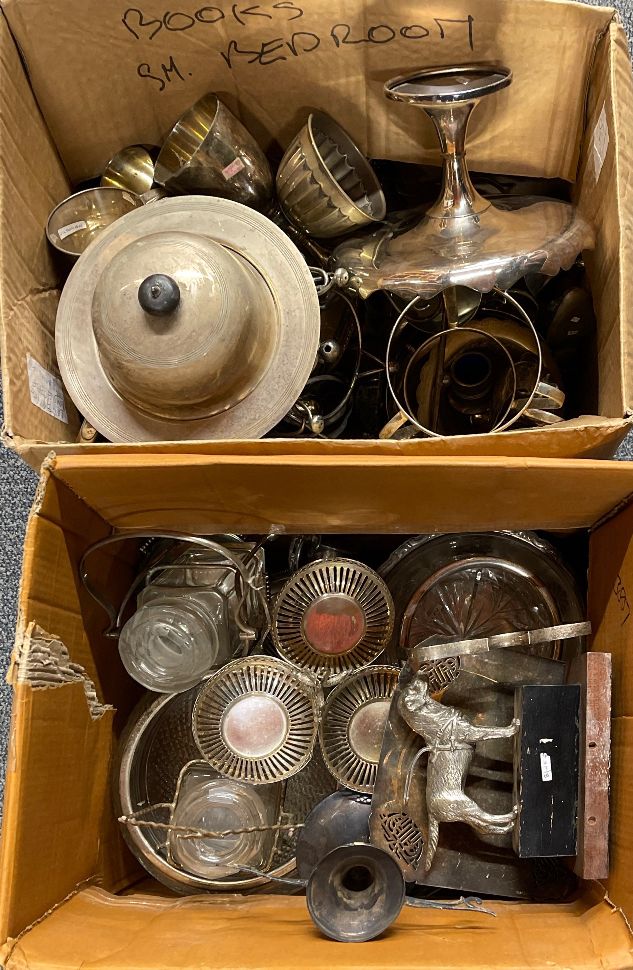 Two extensive boxes of silver plate.