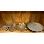 A group of early 20th century Chinese engraved brass trays etc, largest Dia. 30cm.