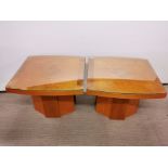 A matching pair of Art Deco satinwood coffe tables with plate glass tops.