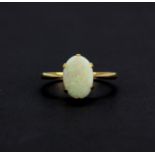 A 9ct yellow gold (stamped 9ct) opal set ring, (R.5).