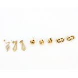 A quantity of 9ct yellow gold stud earrings.