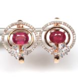 A pair of rose gold on 925 silver earrings set with cabochon cut rubies and white stones, L. 1.8cm.