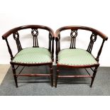 Two pairs of matching mahogany and green upholstered dining chairs, tallest H. 91cm.