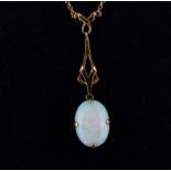 A 9ct yellow gold opal set pendant and chain, in an antique box, L. 4cm.