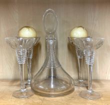Four Waterford Gemini lead crystal ball candle holders. H. 20cm, together with an unmarked similar